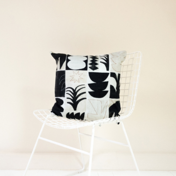 Black and white square cushion cover with abstract shapes