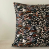 Cushion cover with bird feather patterns