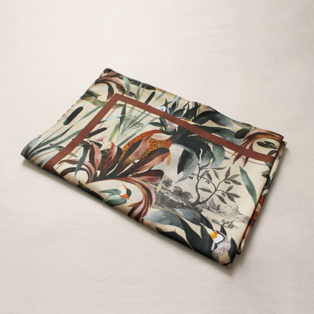 Silk square with plant and animal motifs on an ecru background