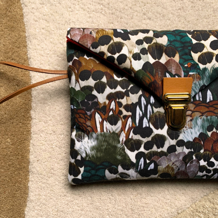 Singularly patterned iPad case inspired by the animal world, containing feathers