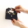 Store your valuable cards in this grained leather card holder